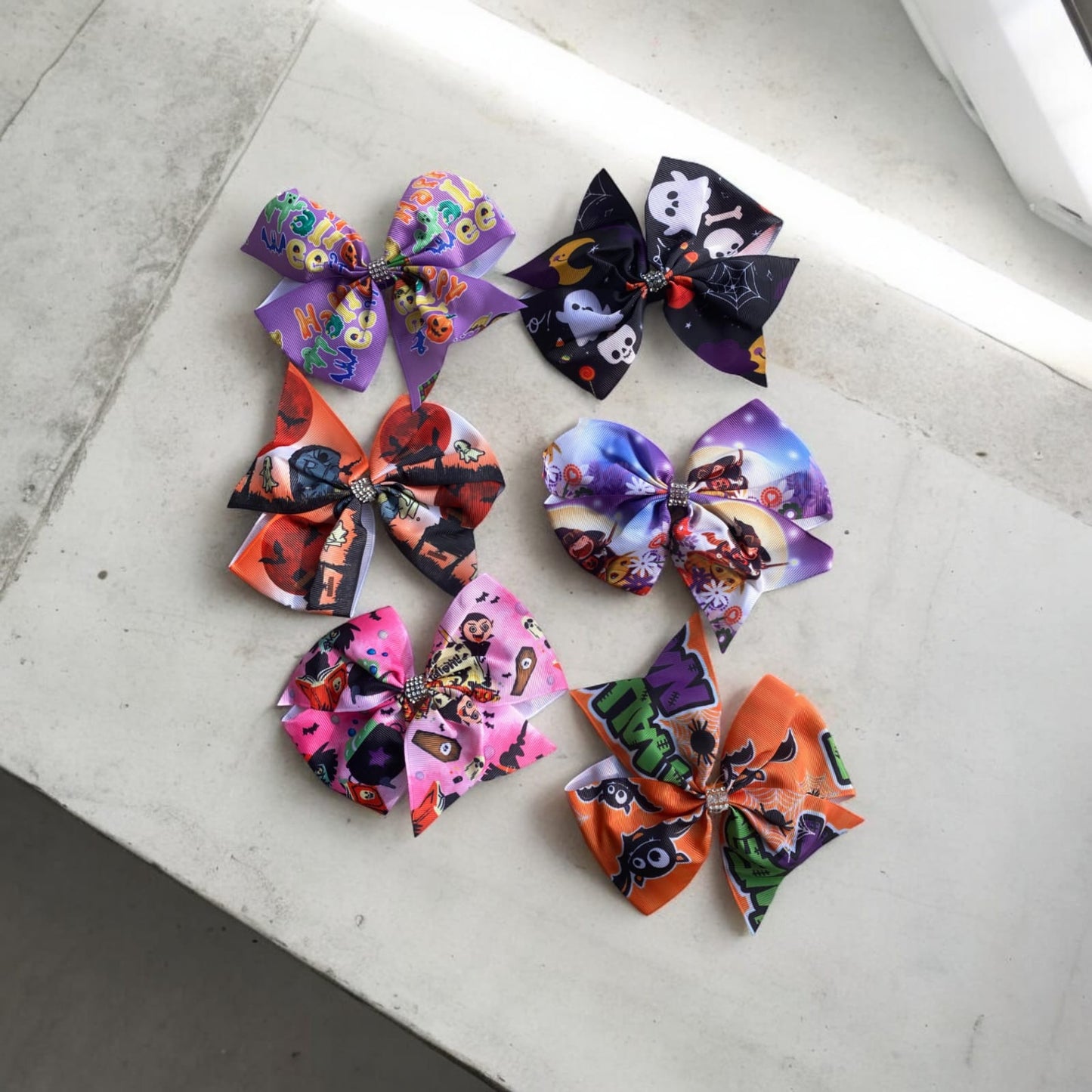 12 Moño estampado Halloween $7.2 c/u