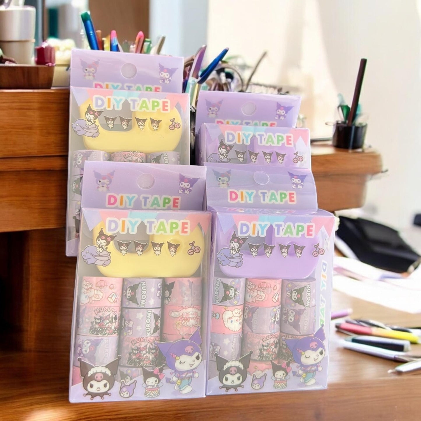 12 Cajitas con 12 Cintas Sanrio Adeshiva y una base $19.5 c/u