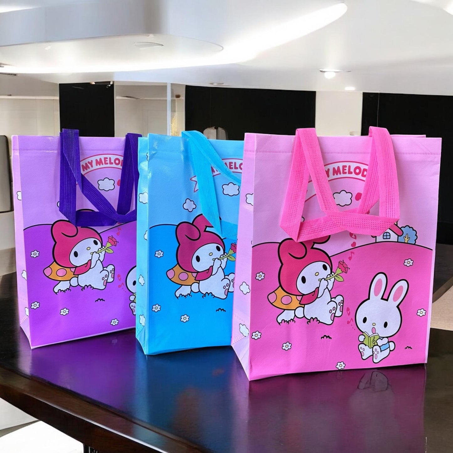 12 Bolsas Reutilizables Sanrio G $8.5 c/u