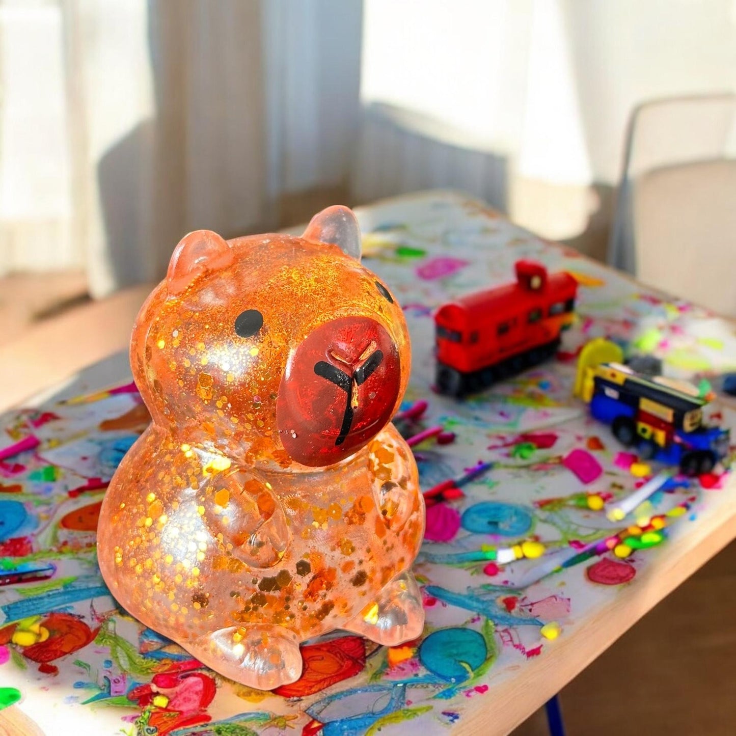 12 Squishies Capibaras Brillos $22.5 c/u