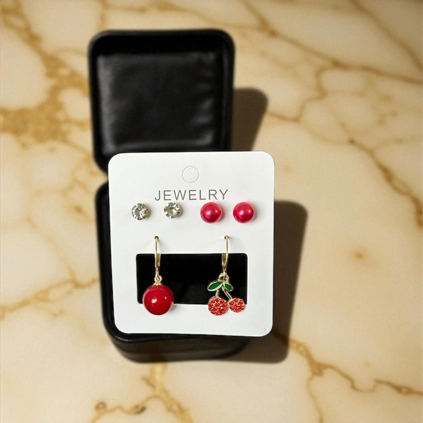 12 Sets de Aretes Cereza/ Pedreria $11.5 c/u