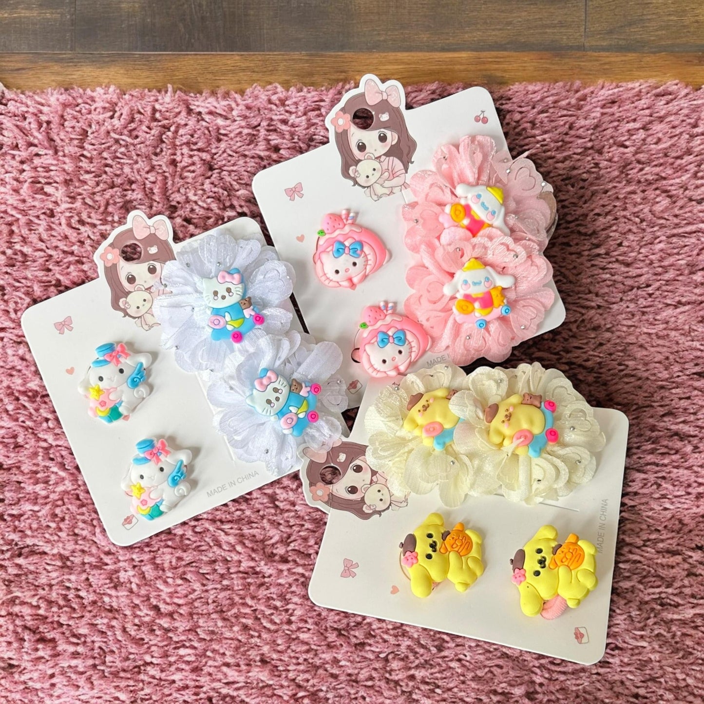 12 Sets Pares de Moños Y Ligas Sanrio/Donas $12 c/u