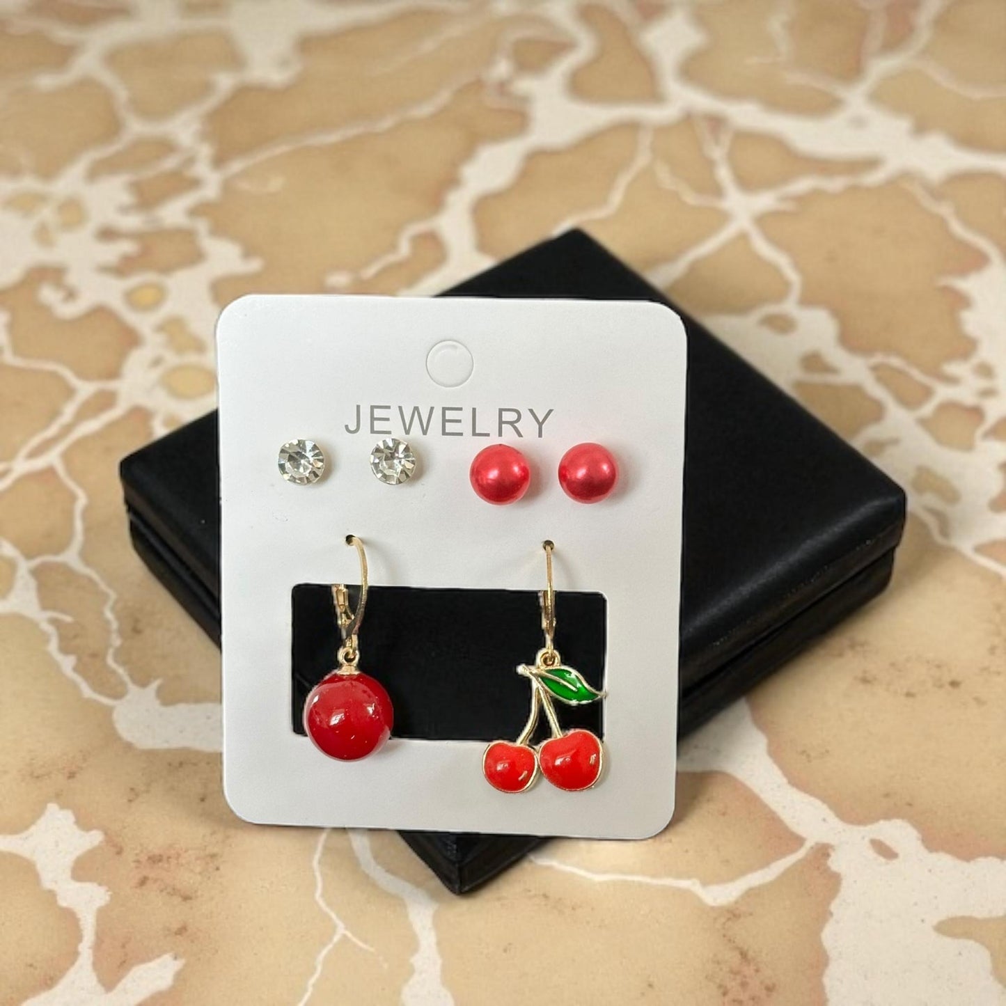 12 Sets de Aretes Cereza/ Pedreria $11.5 c/u