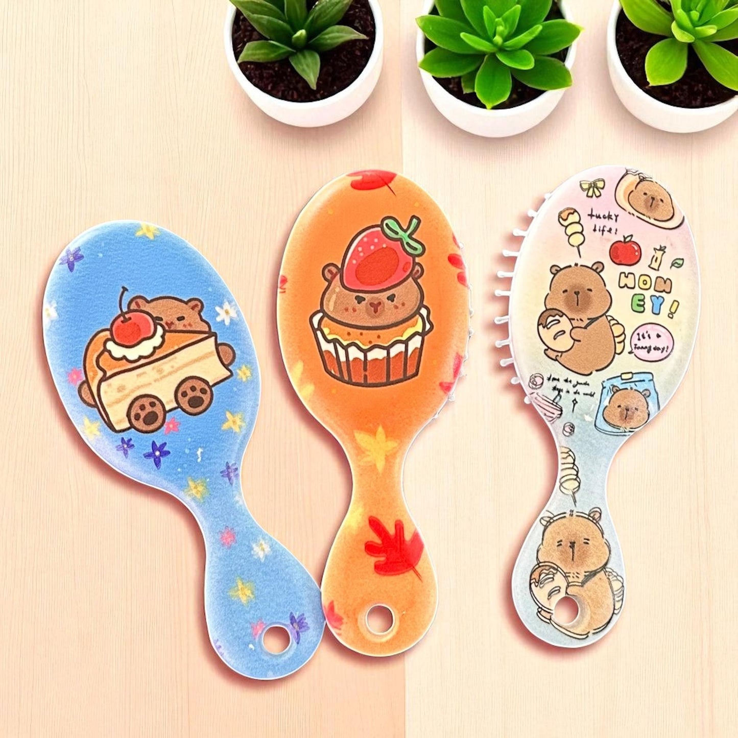 12 Cepillos Capibaras de Bolsillo con Mango $13.2 c/u