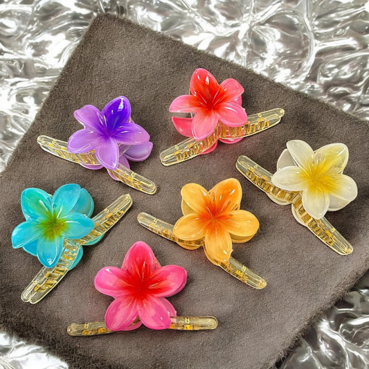 12 Pinzas Largas con Flor Hawaina $13 c/u