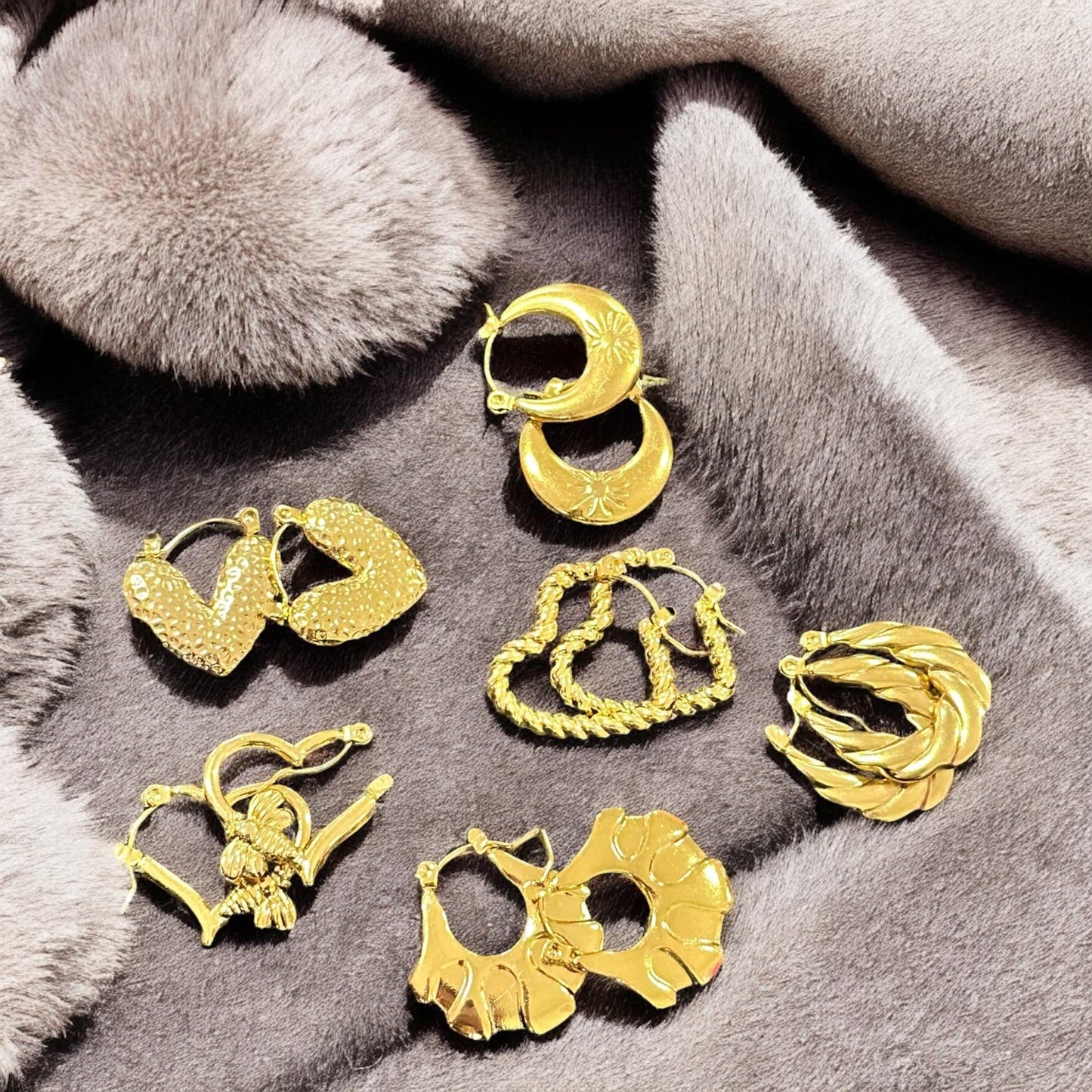 12 Pares de Aretes Dorados Figuras Acero $14 c/u