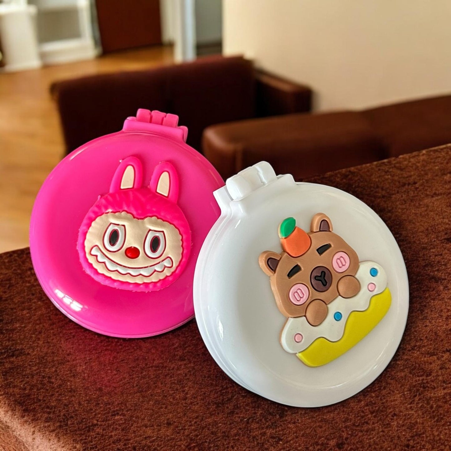 12 Cepillos de Bolsillo con Espejo Labubu/Capibara $13.7 c/u