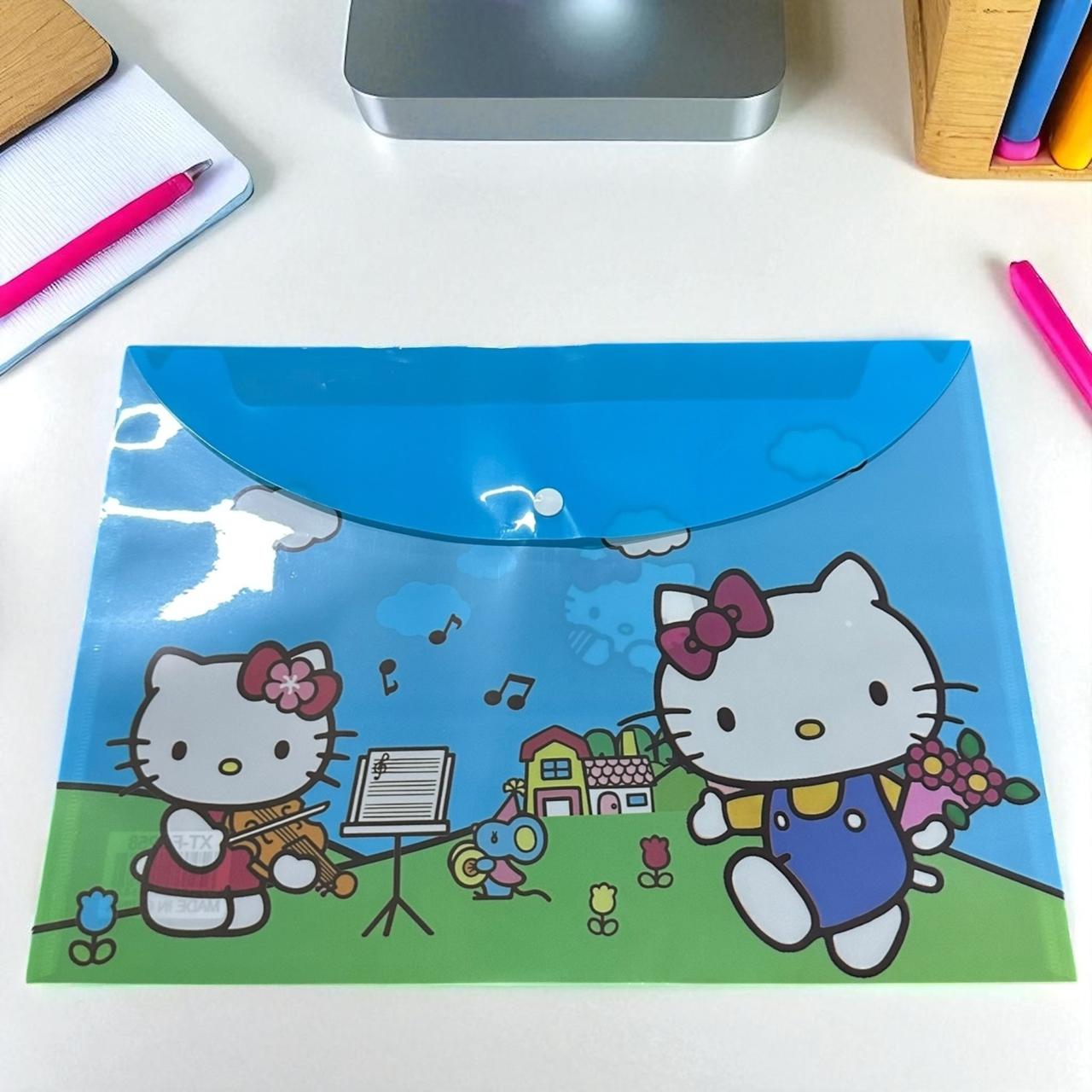 12 Folders Sanrio/Spiderman con Boton $6 c/u