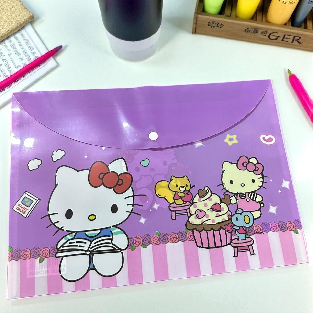 12 Folders Sanrio/Spiderman con Boton $6 c/u