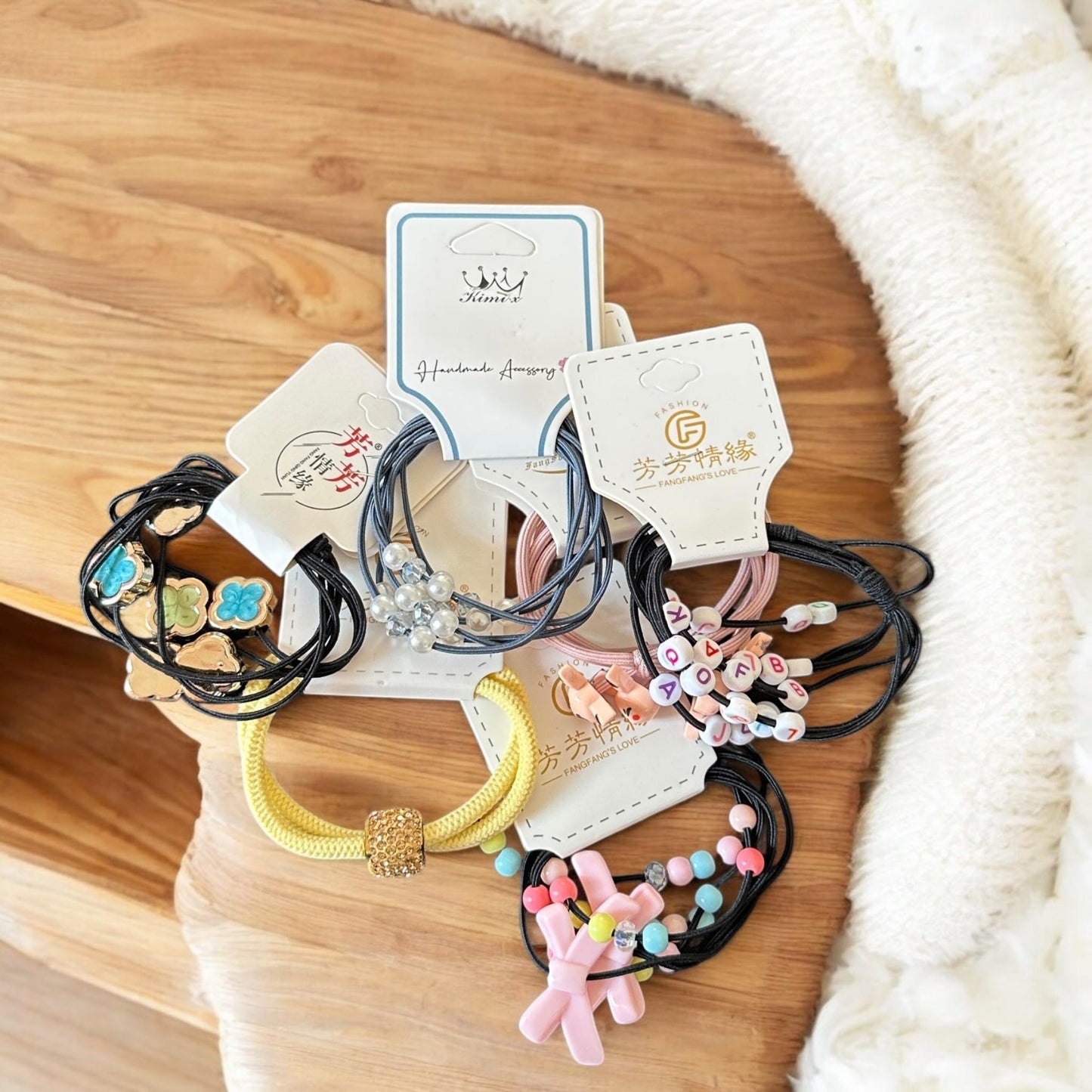 12 Sets de Ligas para Cabello Decoradas $5.9 c/u