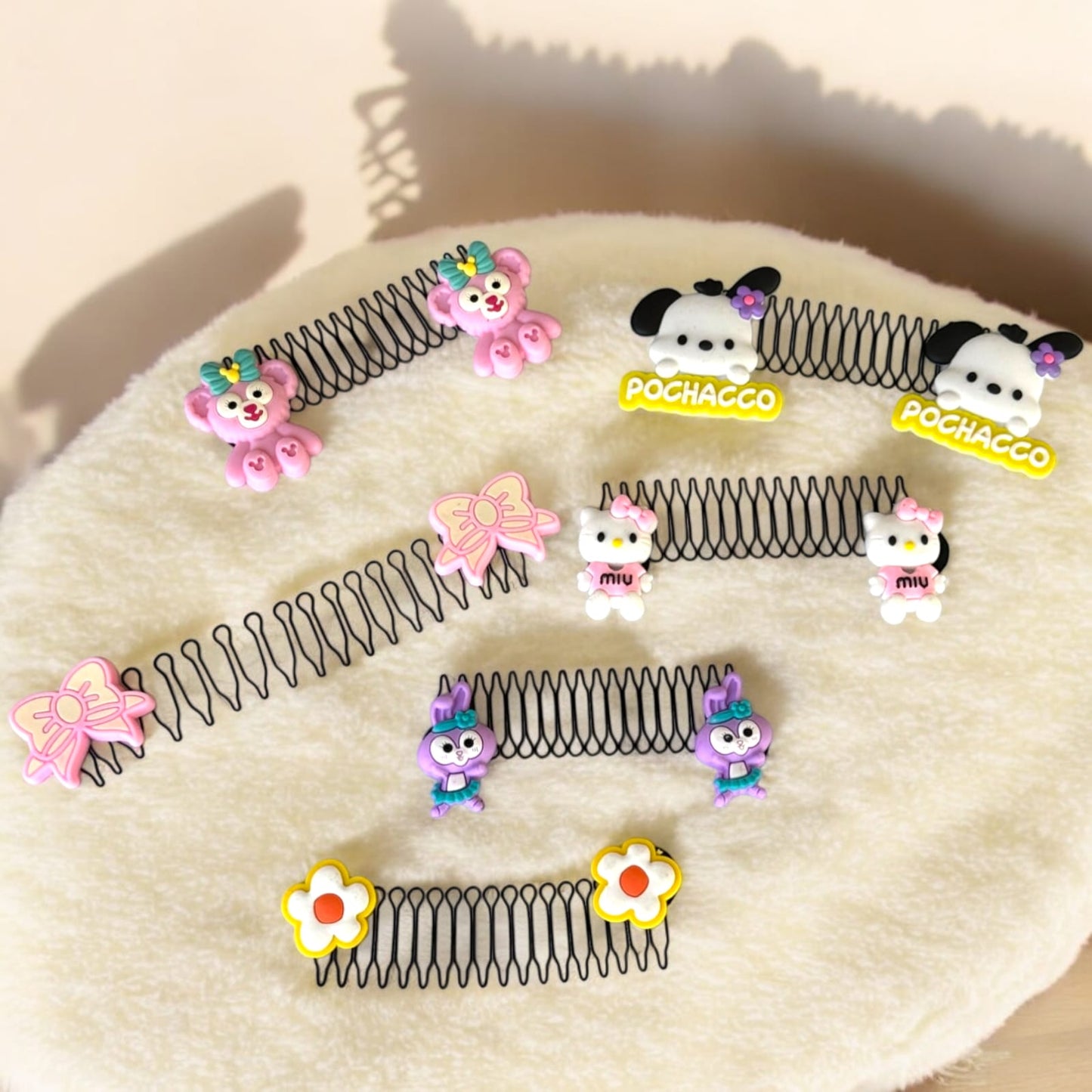 12 Diademas espiral para cabello Sanrio $5.9 c/u