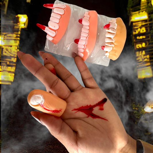 6 Sets Vampiro Colmillos y Dedos Brillan en la Obscuridad  $33 C/U