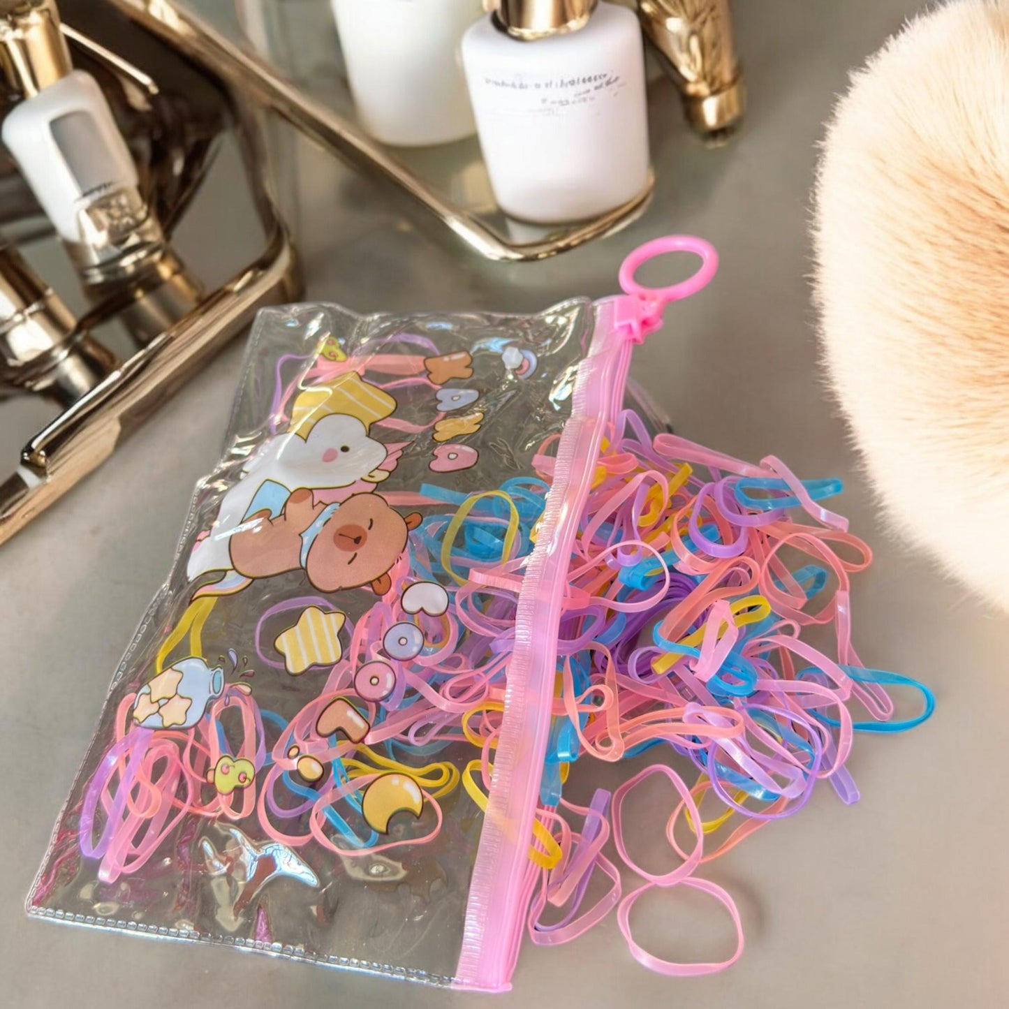 12 Bolsas Capibara Resellables con Ligas para el cabello $6 c/u