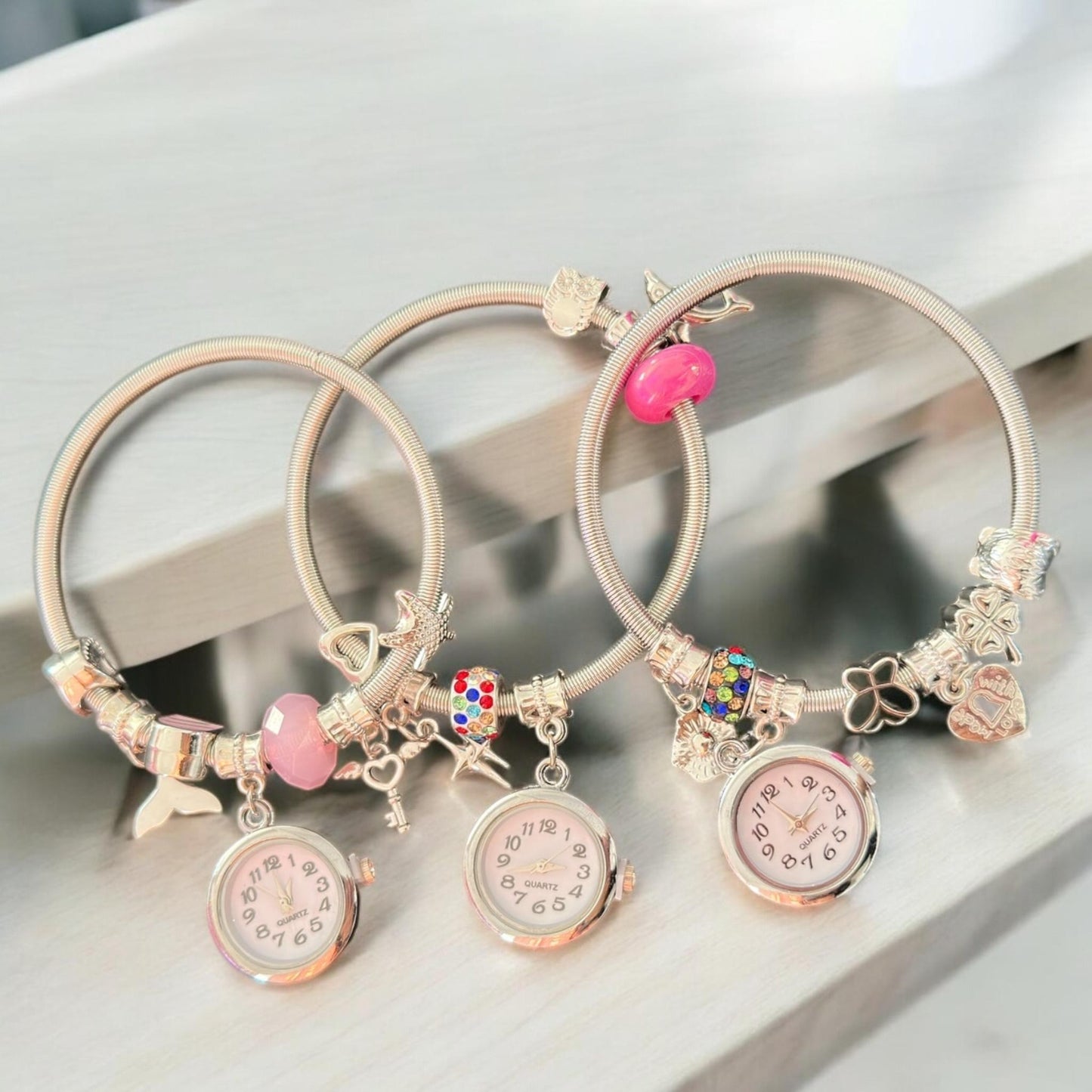 12 Pulseras Con Reloj y Dijes  Tipo Pandora  $39 c/u