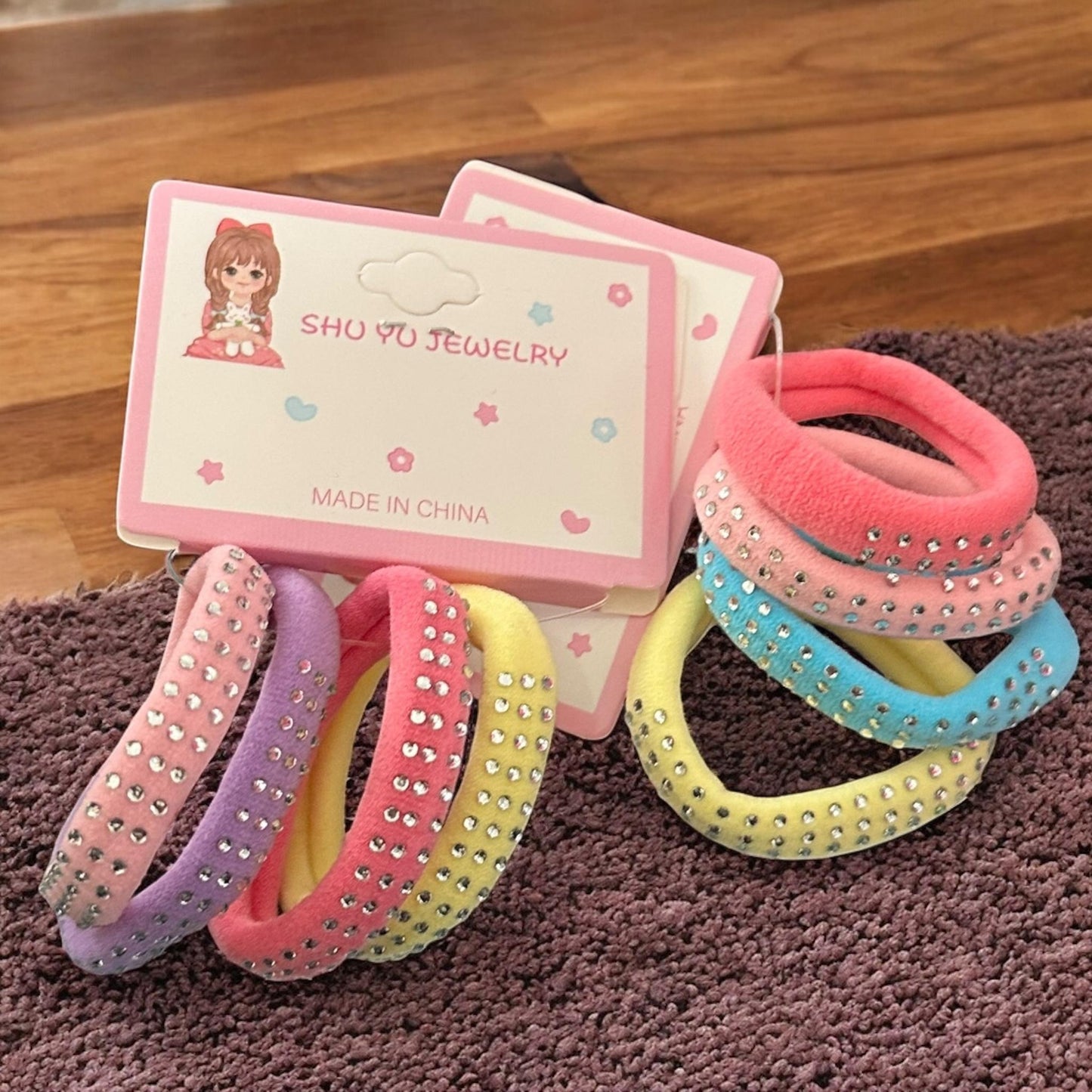 12 Donas Colores para Cabello Brillos $5.9 c/u