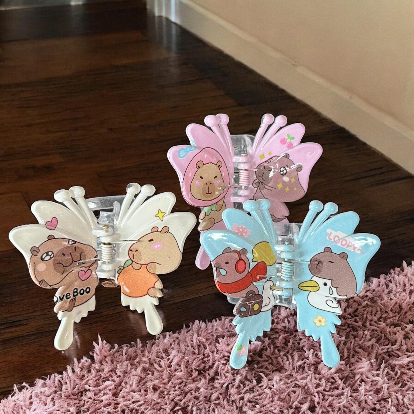 12 Pinzas Mariposas Capibaras/Labubu Decoradas $10.5 c/u