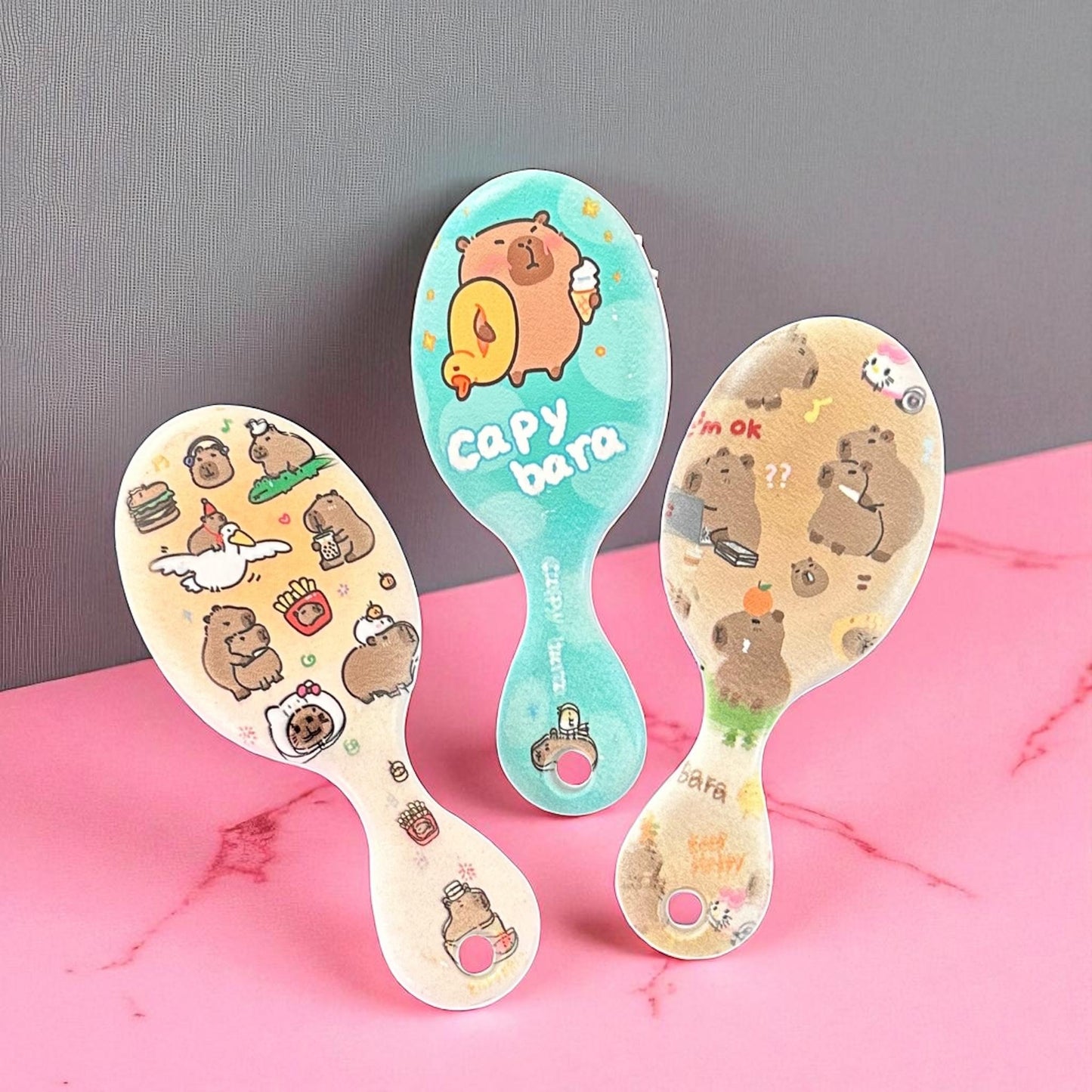 12 Cepillos Capibaras de Bolsillo con Mango $13.2 c/u