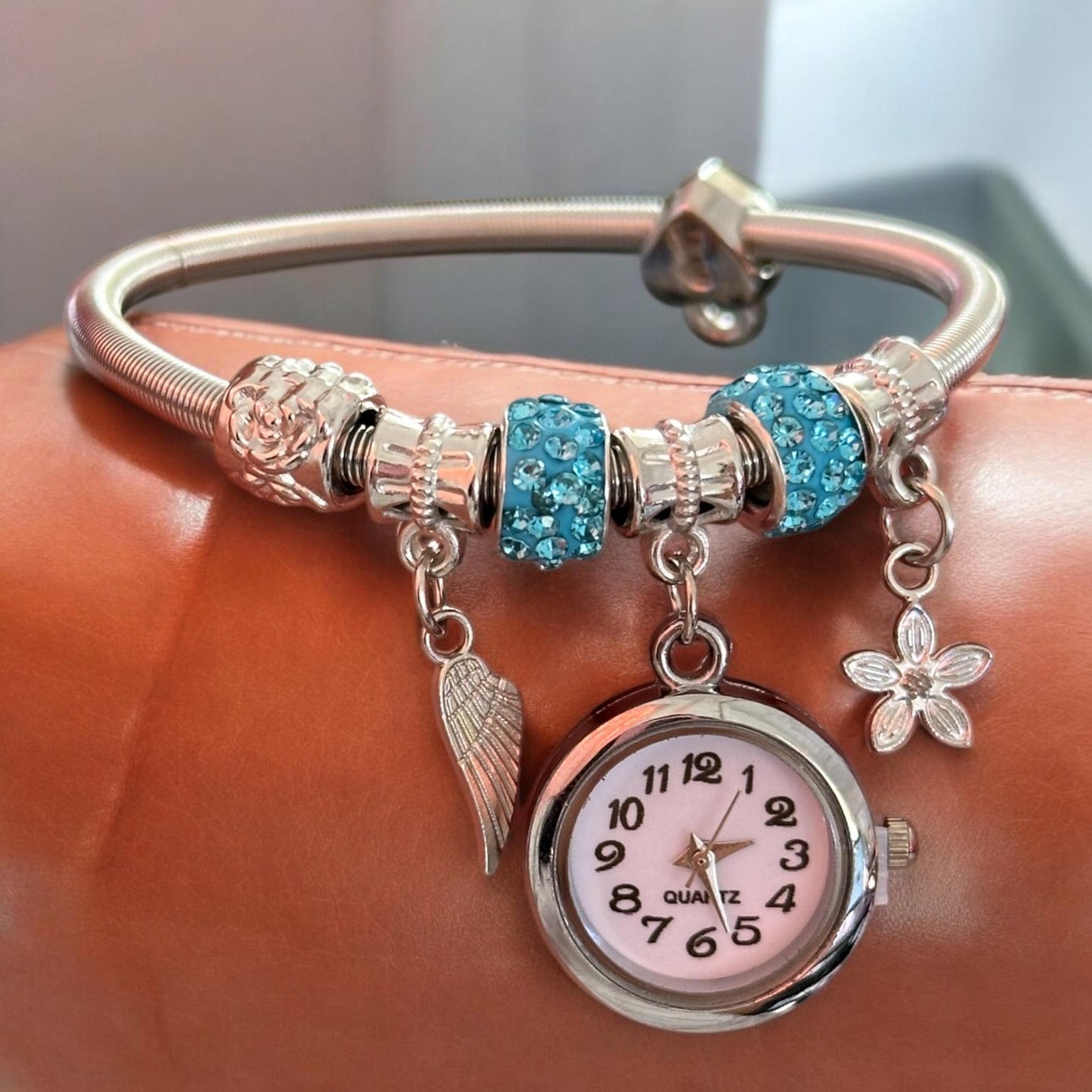 12 Pulseras Con Reloj y Dijes  Tipo Pandora  $39 c/u