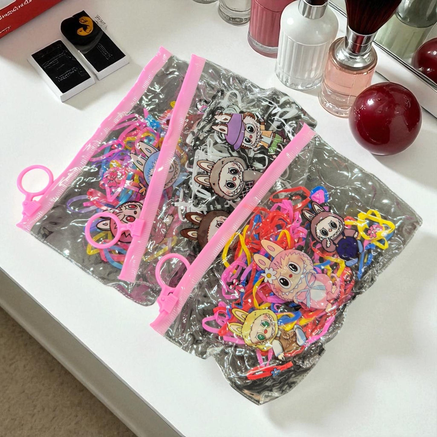 12 Bolsas Labubus Resellables con Ligas para el cabello $6 c/u