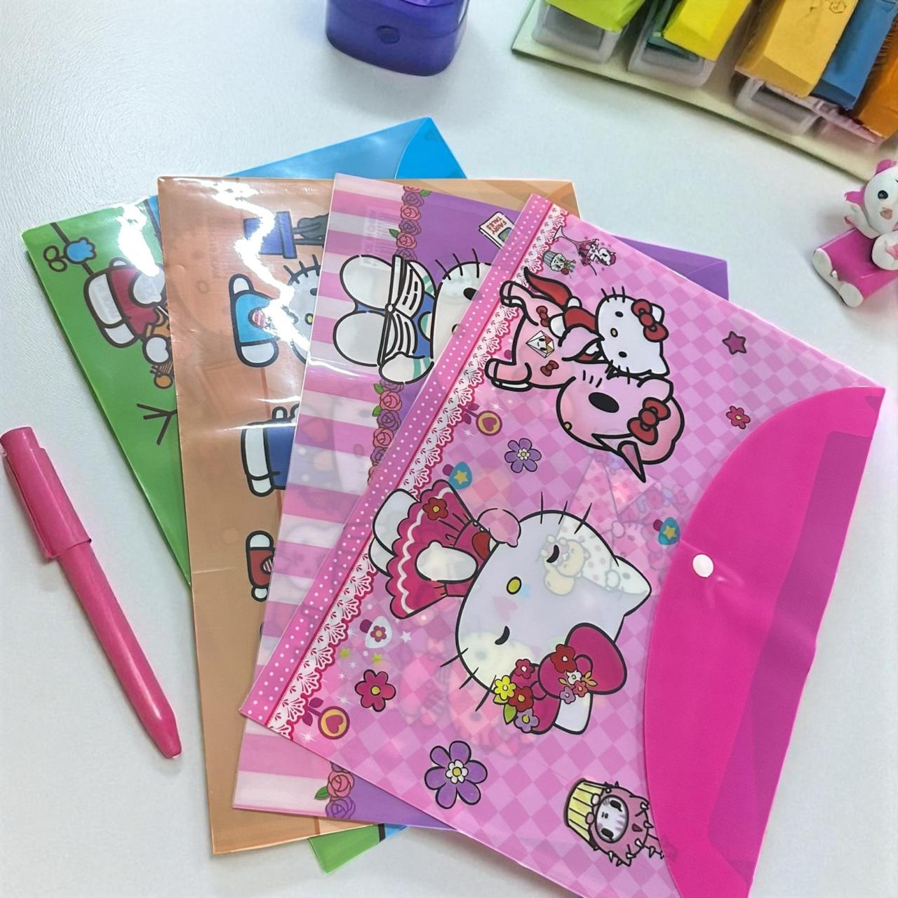 12 Folders Sanrio/Spiderman con Boton $6 c/u
