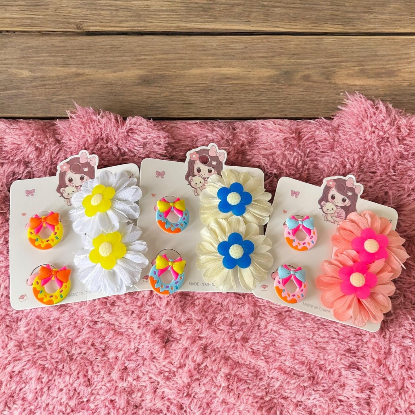 12 Sets Pares de Moños Y Ligas Sanrio/Donas $12 c/u