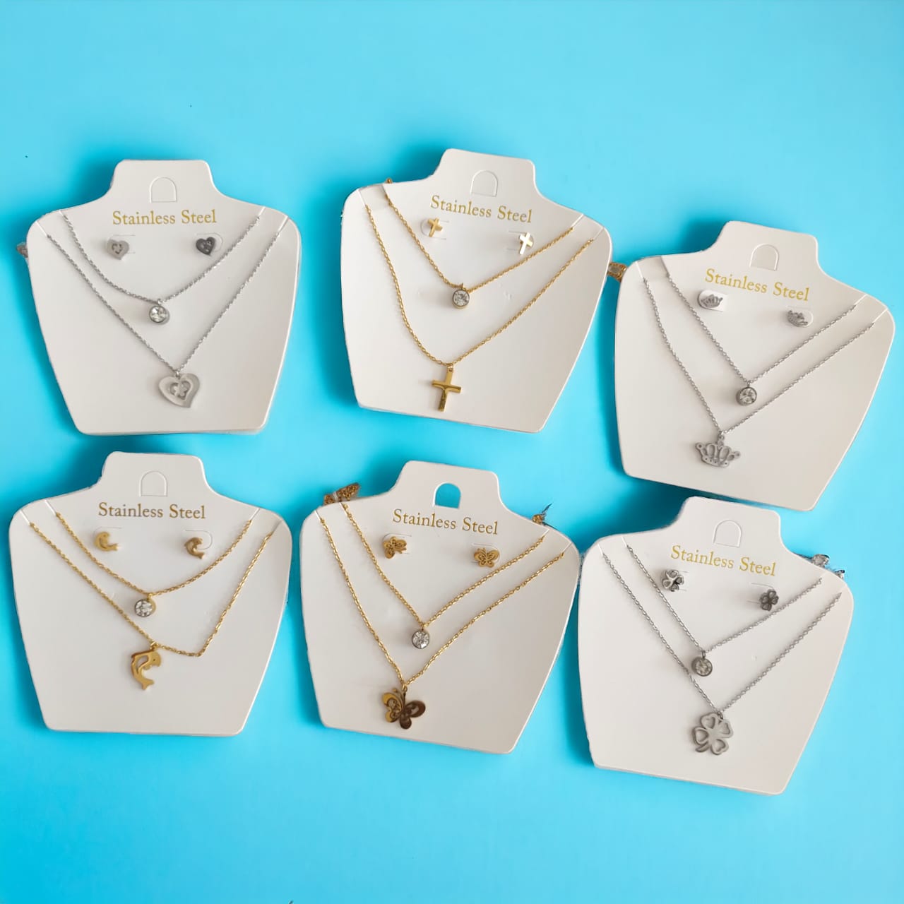 12 Sets Acero Inoxidable Aretes y Collares $26.52 c/u