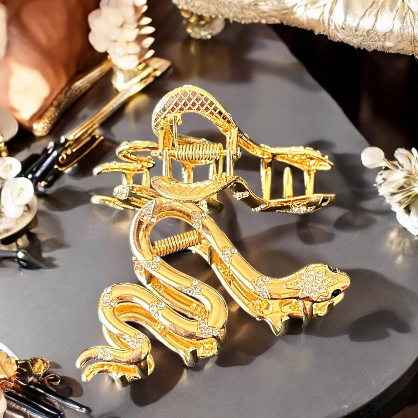 12 Pinzas Serpientes Metalicas con Pedrería $15 c/u