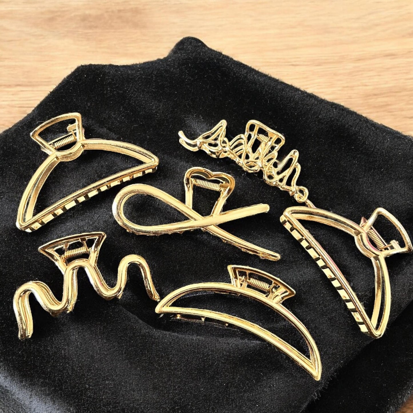 12 Pinzas Doradas Figuras metalicas Grandes $19 c/u