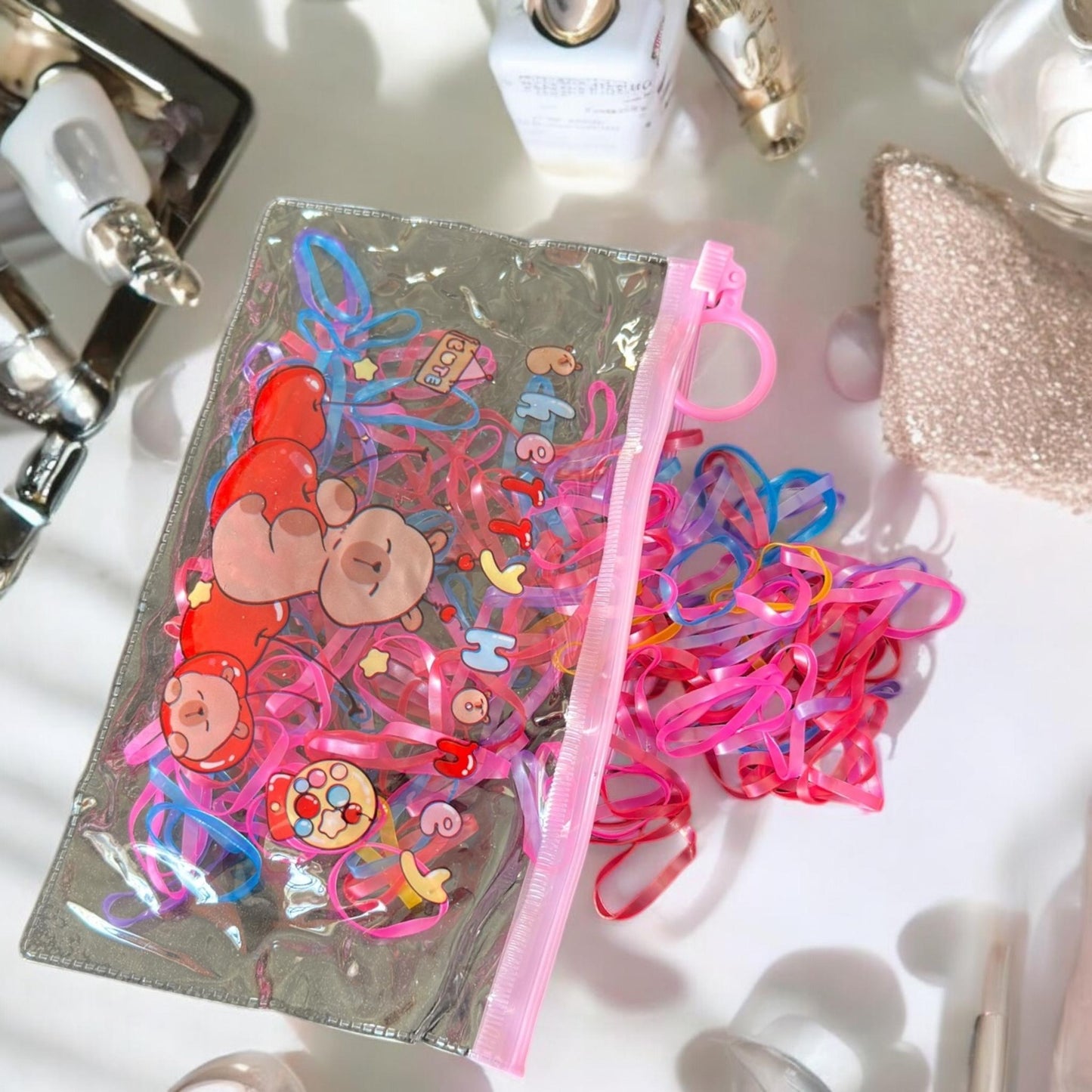 12 Bolsas Capibara Resellables con Ligas para el cabello $6 c/u