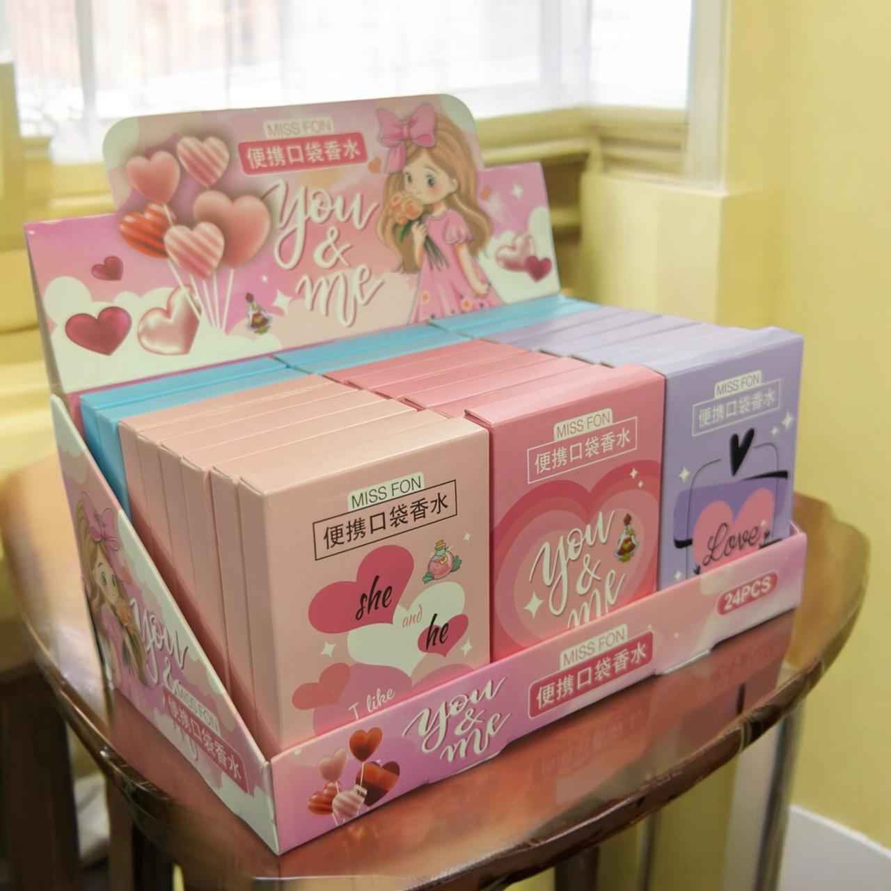 24 Perfumes Bolsillo Corazones $12.5 c/u