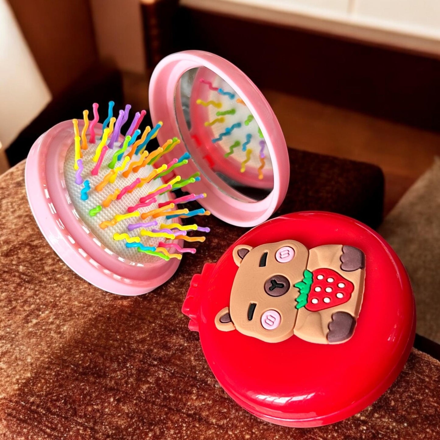 12 Cepillos de Bolsillo con Espejo Labubu/Capibara $13.7 c/u